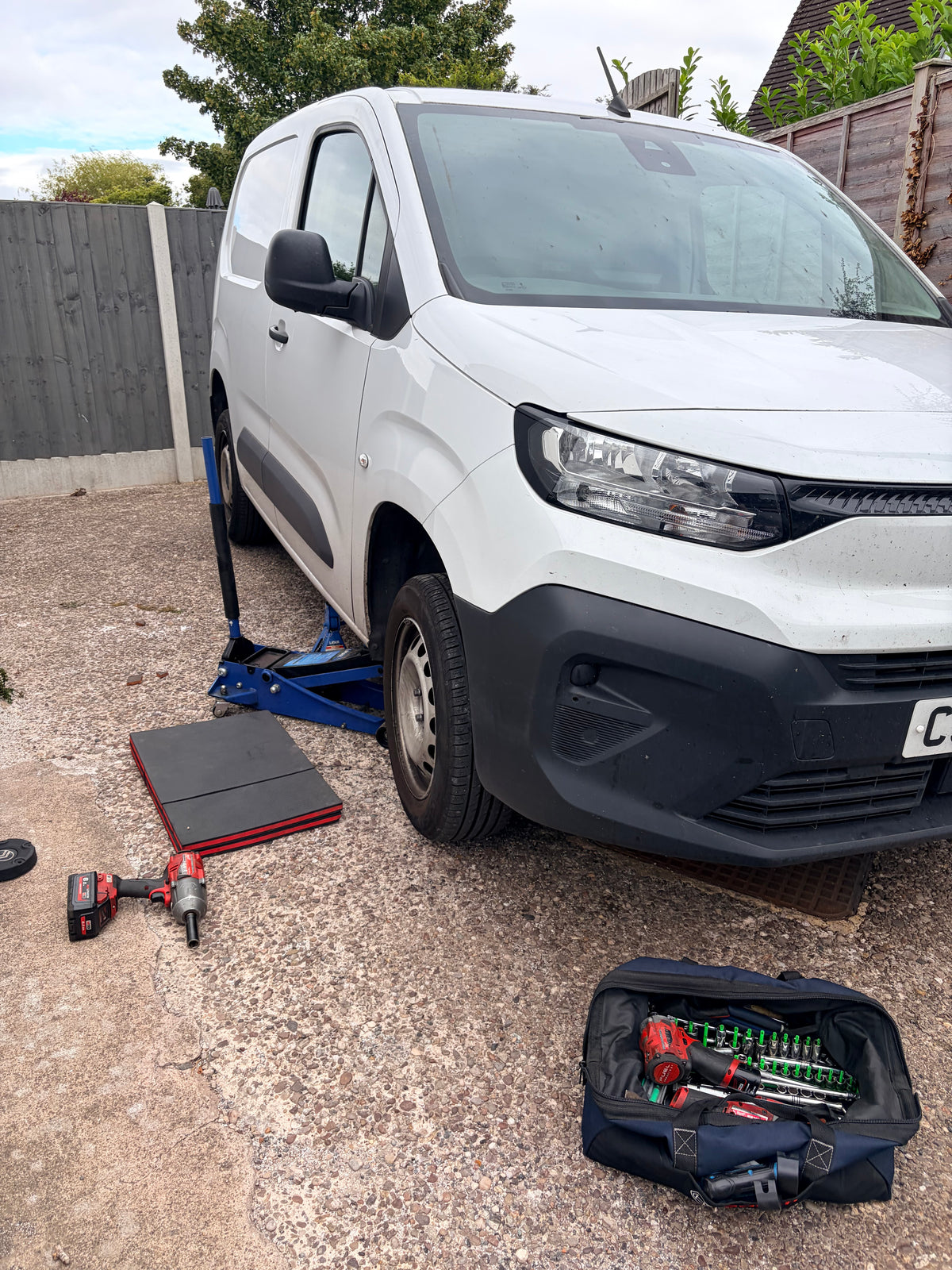Crighton Repair & Service preparing the vehicle for brake pads replacement at customers home address in the staffordshire area.